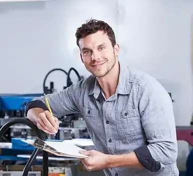 Business owner reviewing equipment financing paperwork